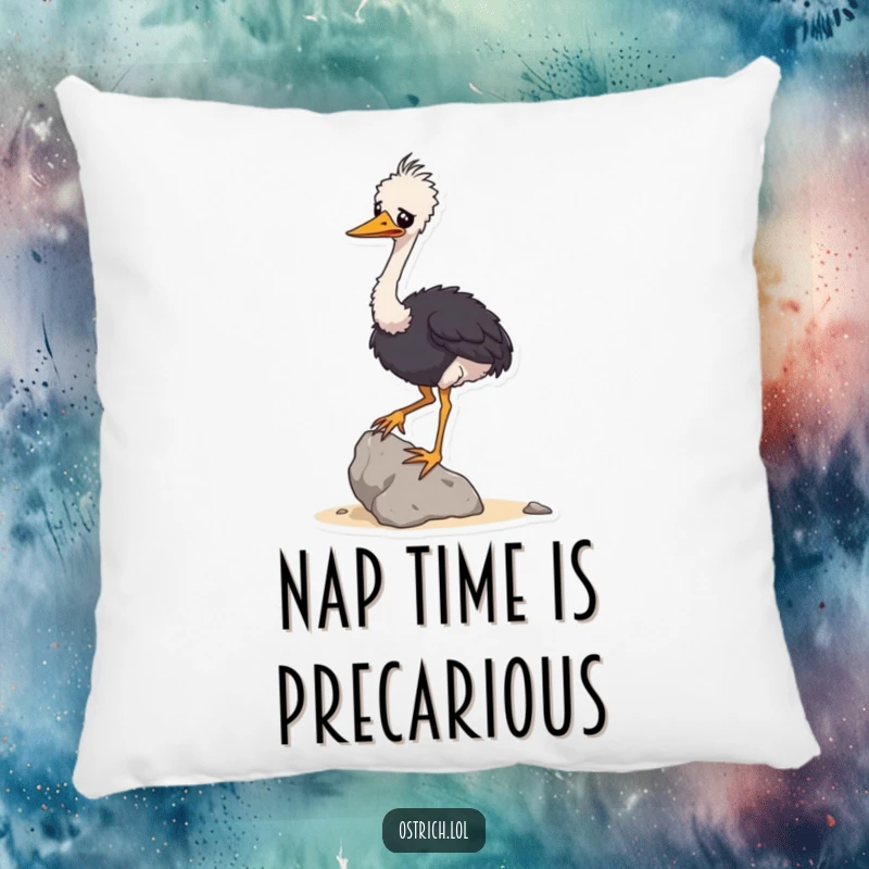 Funny pillow featuring a wobbly ostrich character attempting to balance a small rock, offering plush comfort and humor.