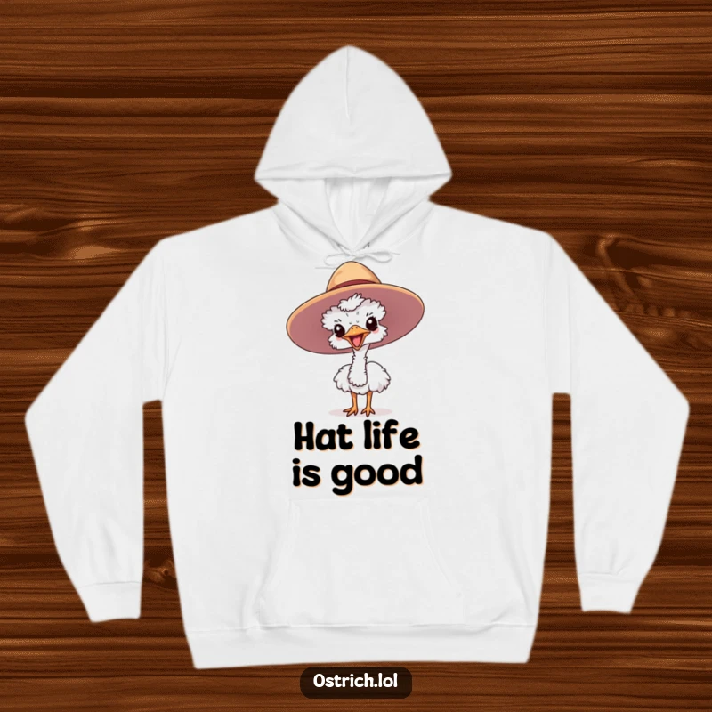 Funny ostrich hoodie with a cute character joyfully emerging from a large hat, offering cozy and humorous vibes.