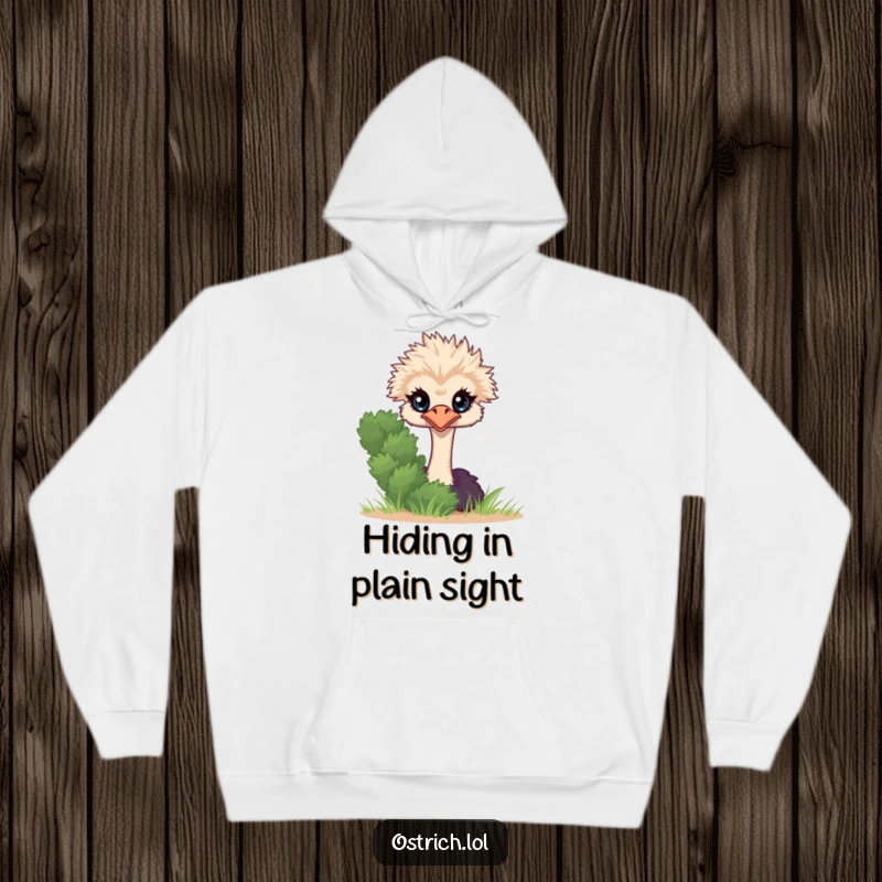 Funny Ostrich Peeking Hoodie, a shy character hiding behind a bush, offering warmth and a giggle.