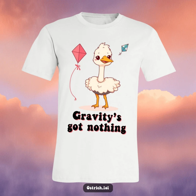 Funny ostrich t-shirt depicting a grinning bird with a hopeful look, determinedly attempting to get a small kite airborne.