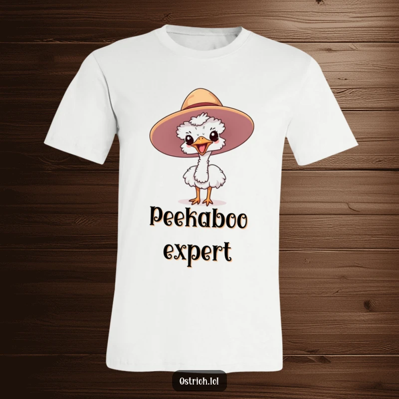 Funny ostrich T-Shirt featuring a cute character joyfully peeking out of a large hat, a whimsical fashion statement.